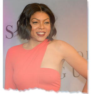 Taraji P. Henson in a red dress with a sleek bob haircut, advocating for mental health and supporting Black men through her foundation.