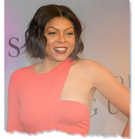 Taraji P. Henson in a red dress with a sleek bob haircut, advocating for mental health and supporting Black men through her foundation.